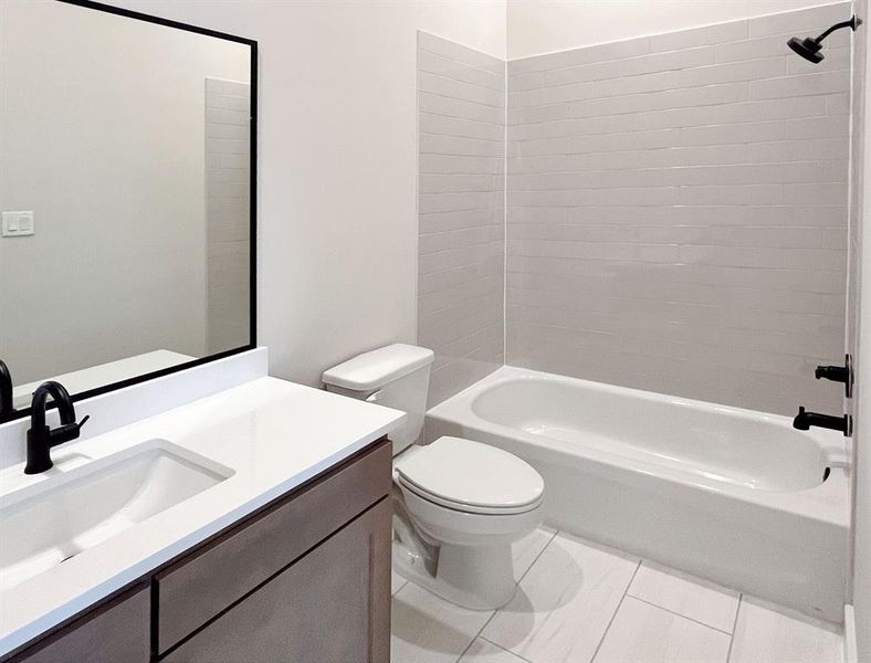 Chic Upper-Level Bathroom with Modern Finishes