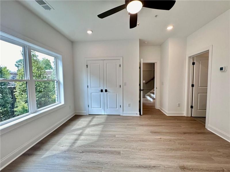 Oversized windows make this an ideal guest bedroom or an office space