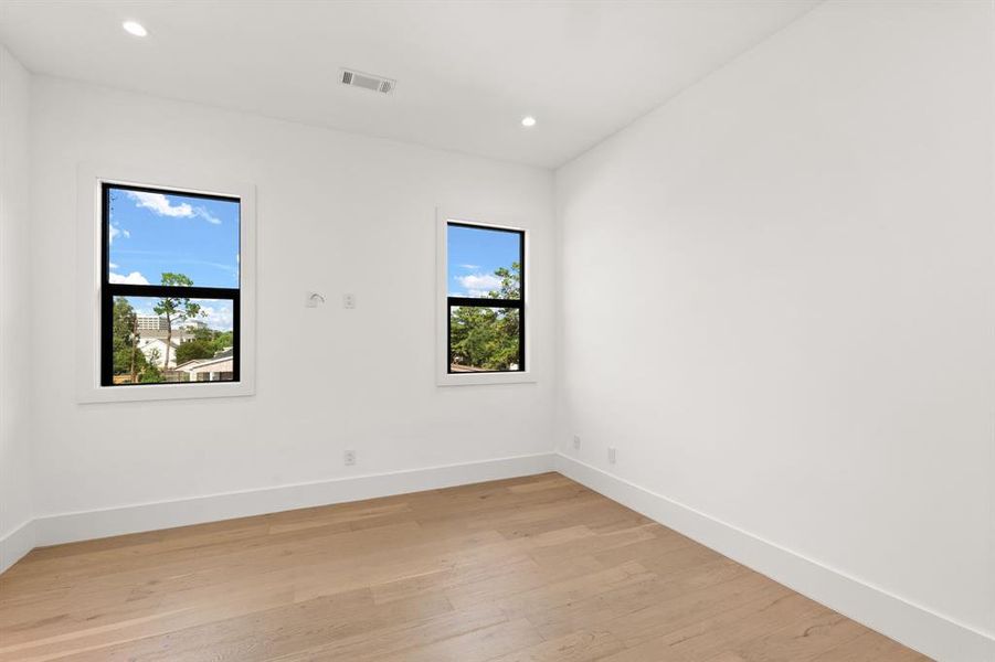 An additional view of the Fantastic Flex Room on the second floor which would make a great media room, home office or playroom with built-in shelving and double doors.