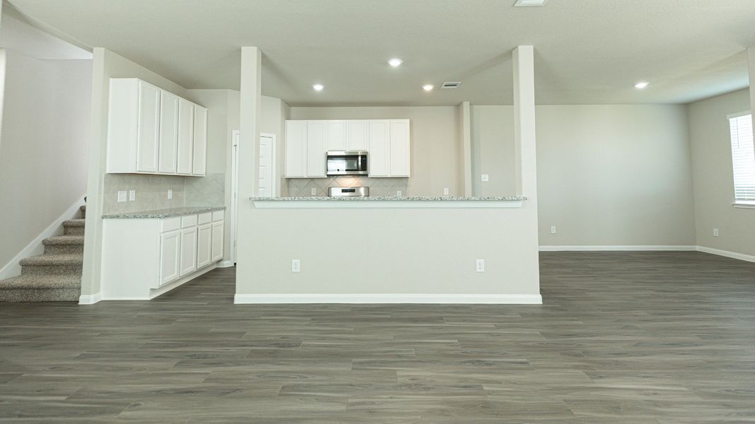 Family Room to Kitchen and Dining Area