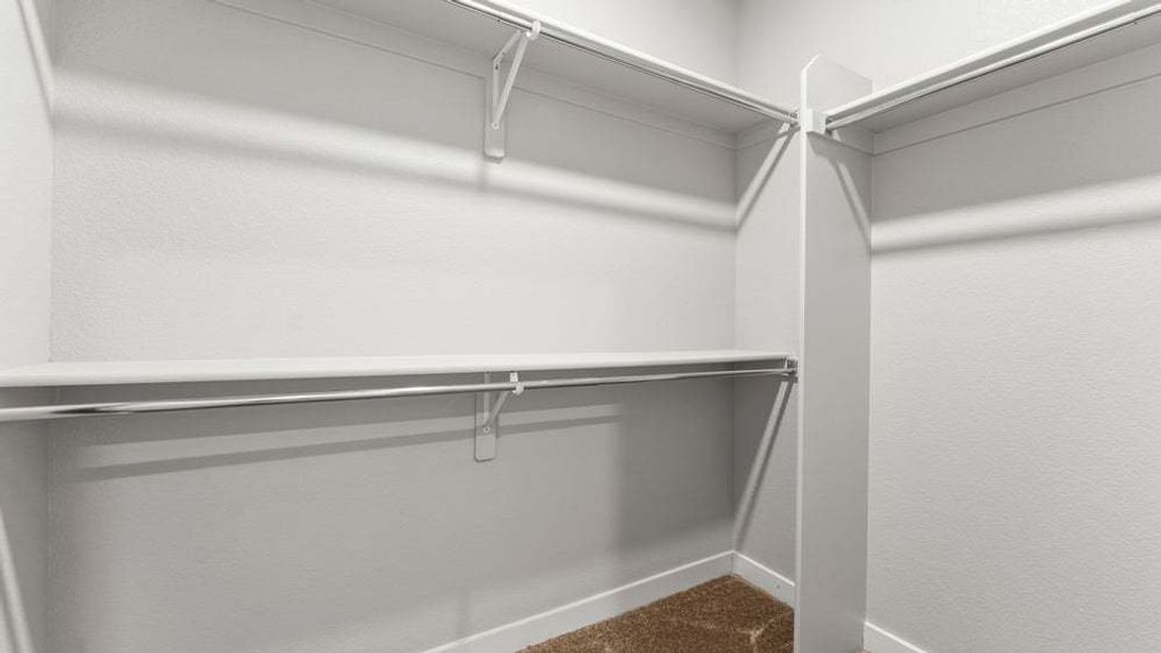 Primary Closet - Not Actual Home - Finishes May Vary