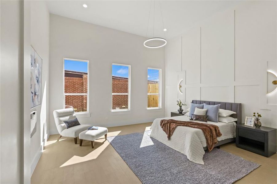 Bedroom featuring a high ceiling