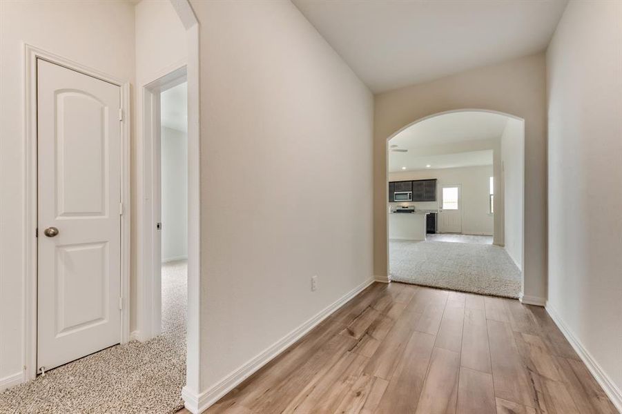 Hall featuring light hardwood / wood-style floors