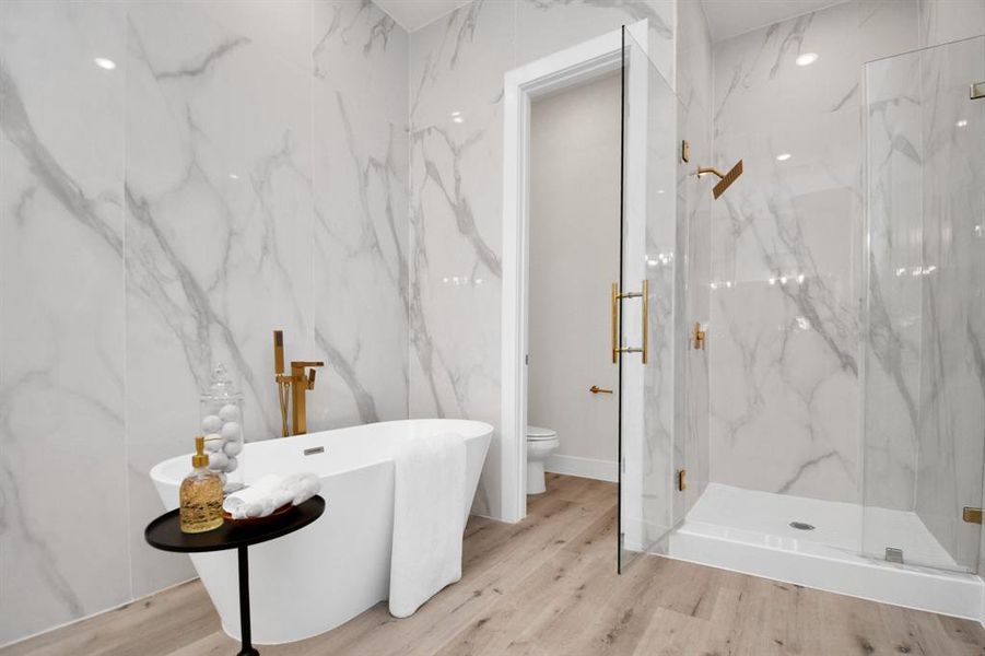 Another view of your soaking tub and standing shower. Floor to ceiling tile surround.