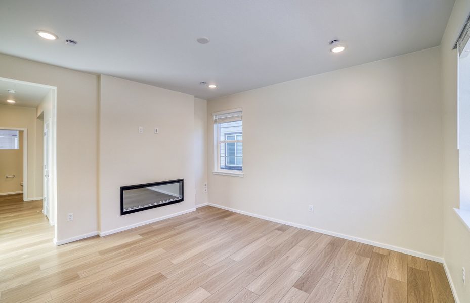 Inviting Gathering Room with an electric fireplace