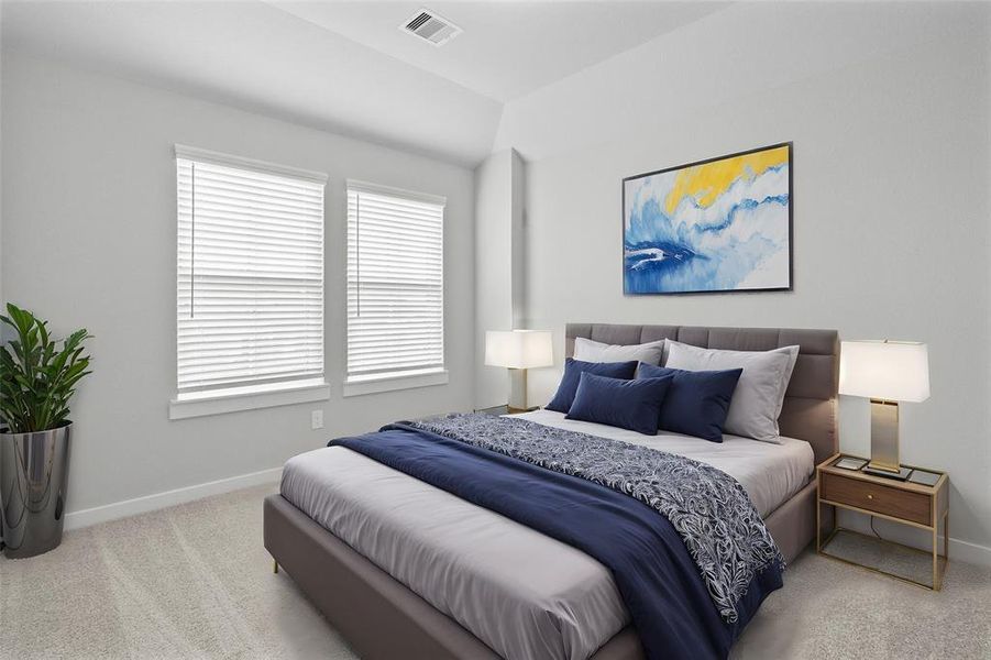 Secondary bedroom features plush carpet, custom paint, lighting, and large windows with privacy blinds.