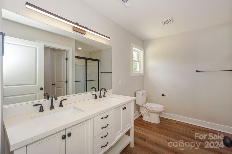 (Representative photo) The owners suite bathroom will be similar to this one.