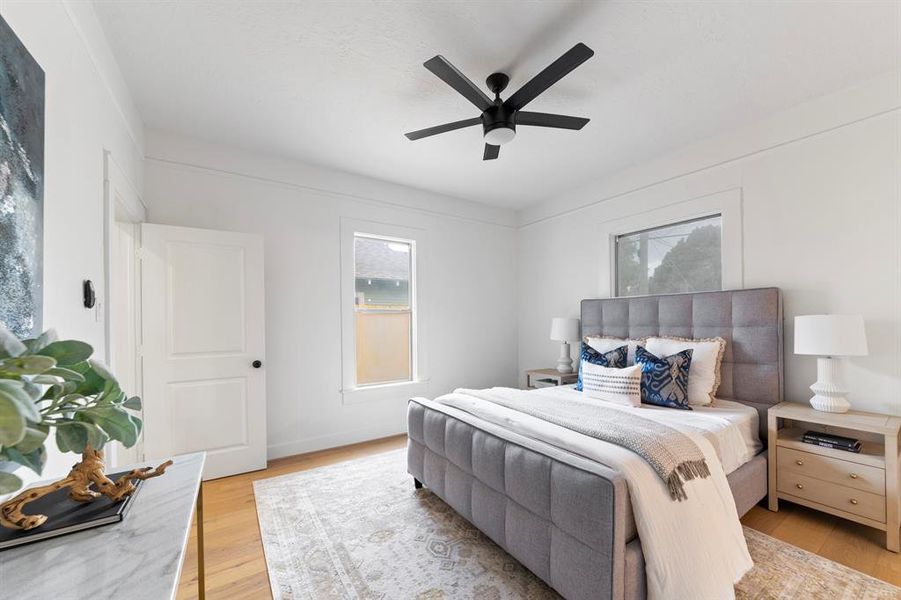 Stunning engineered white oak hardwood floors throughout every bedroom.