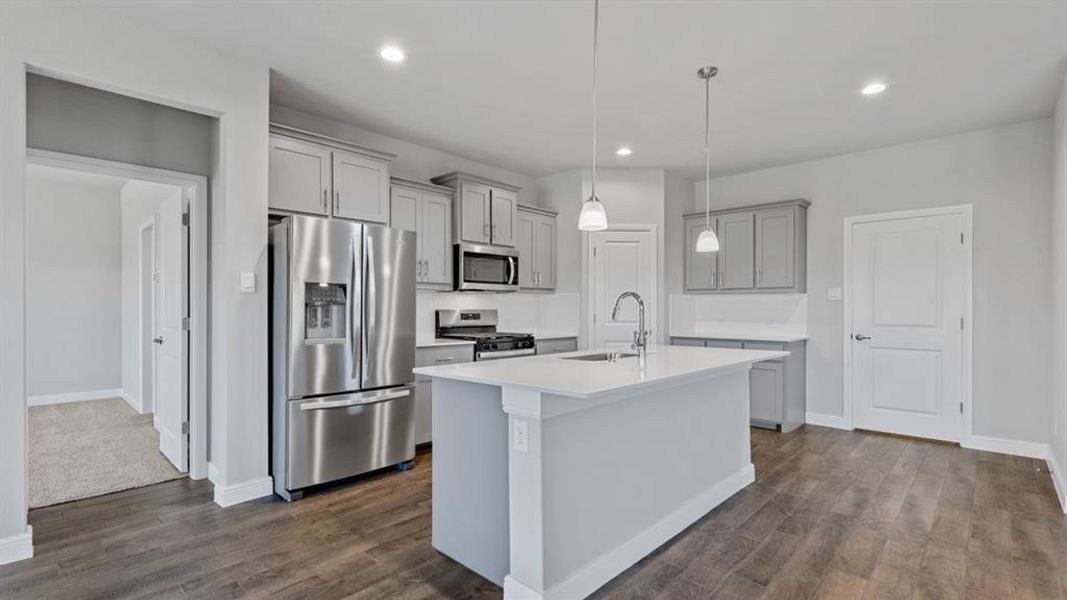 Kitchen - All Home and community information, including pricing, included features, terms, availability and amenities, are subject to change at any time without notice or obligation. All Drawings, pictures, photographs, video, square footages, floor plans, elevations, features, colors and sizes are approximate for illustration purposes only and will vary from the homes as built.