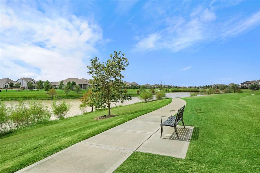 2-minute walk to nearby lake trail (Entrance near 23807 Silver Liriope Ln).