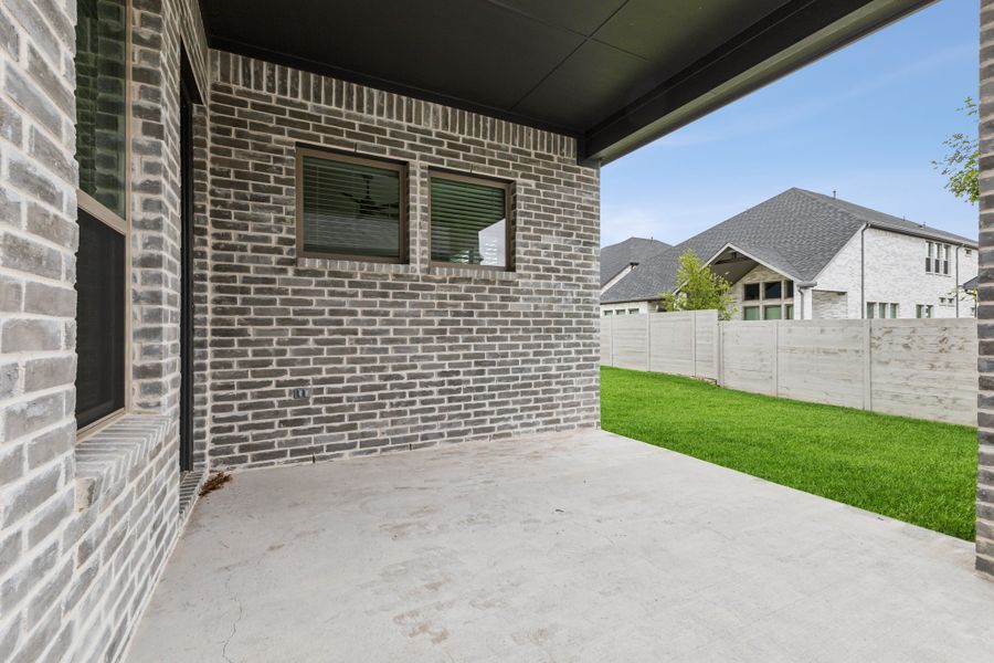 Covered Patio in the Matisse home plan by Trophy Signature Homes – REPRESENTATIVE PHOTO