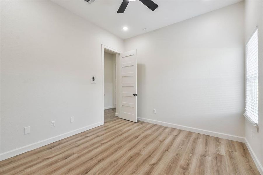 All bedrooms have high 10ft ceilings (note the remote "holder" by the light switch for the ceiling fan).