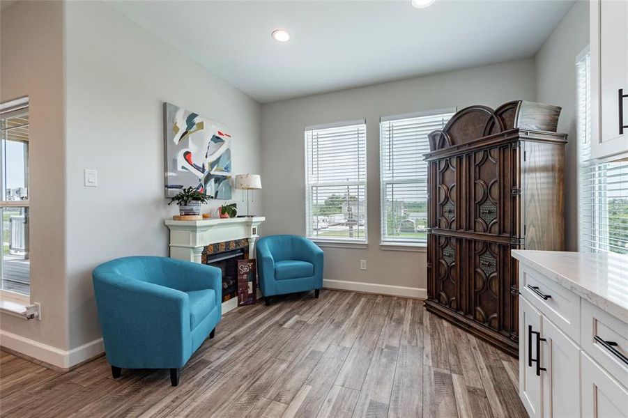 sitting area just off of the kitchen could also be used for a breakfast area