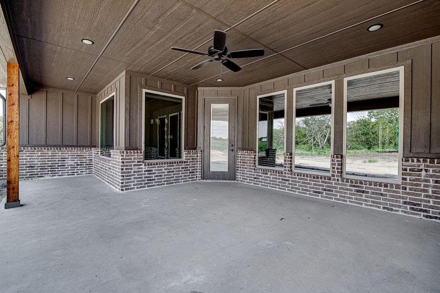 View of patio with ceiling fan