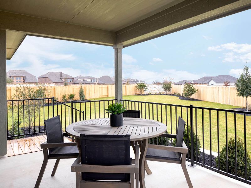 Enjoy the spacious covered patio with friends and family - included with every home.