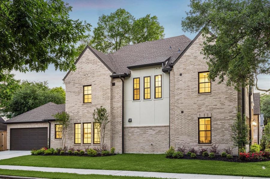 Enjoy the convenience of an attached 2-car garage plus additional driveway parking off of Benignus.