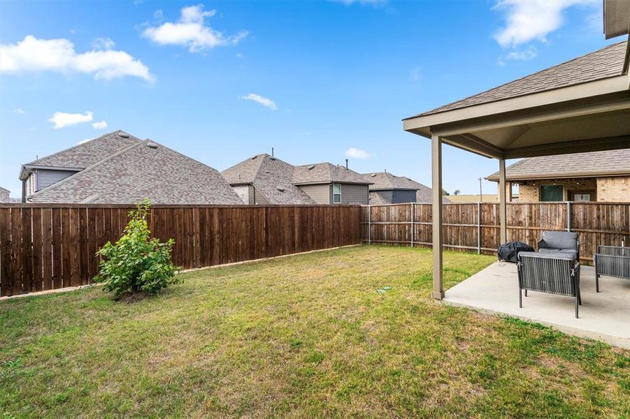 View of yard with a patio area