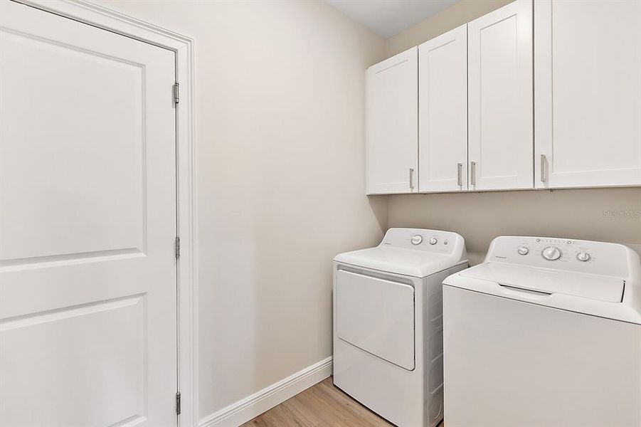 Laundry room with cabinetry