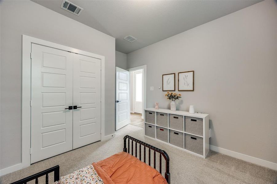 Bedroom with carpet flooring