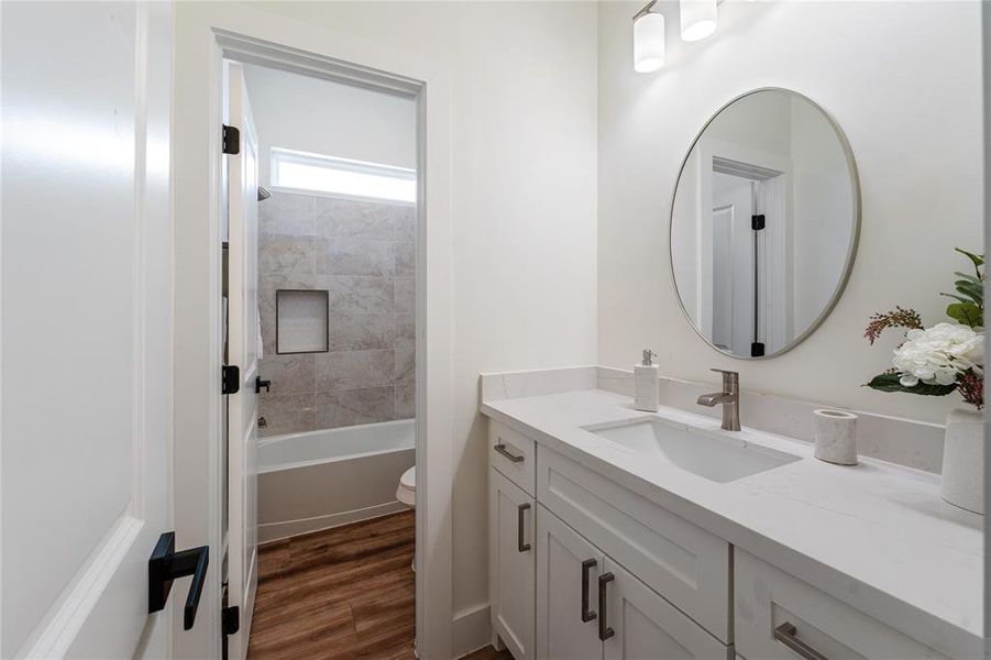 Impressive Full Bath with split bathroom design.