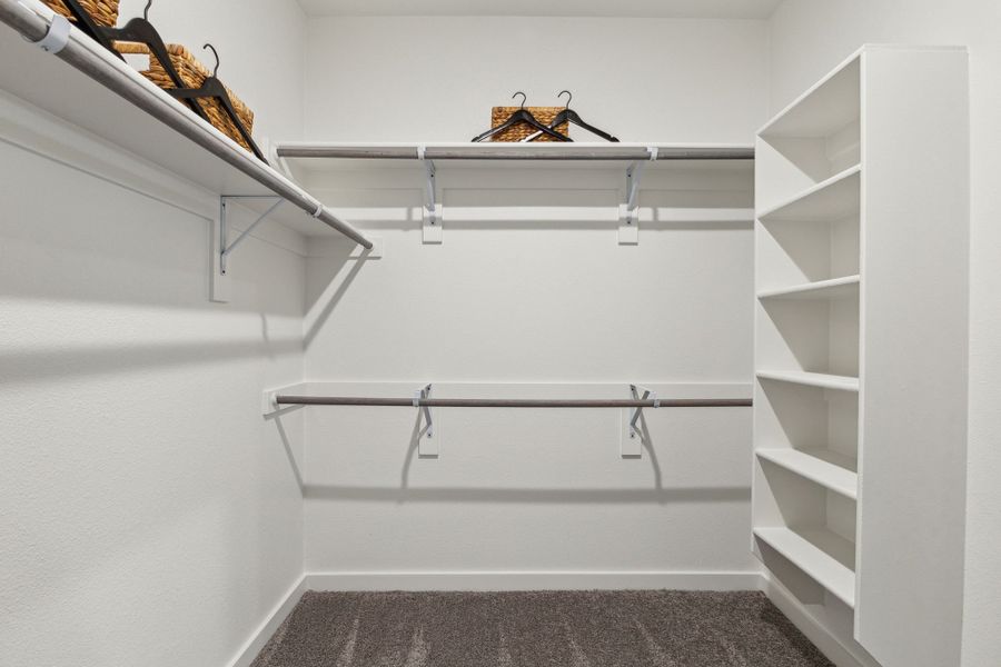 Primary Closet in the Emmy II home plan by Trophy Signature Homes - REPRESENTATIVE PHOTO