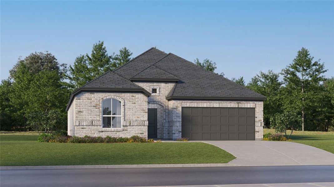 French country inspired facade with a front yard and a garage