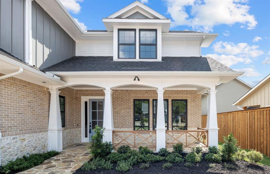 View of front of property with covered porch