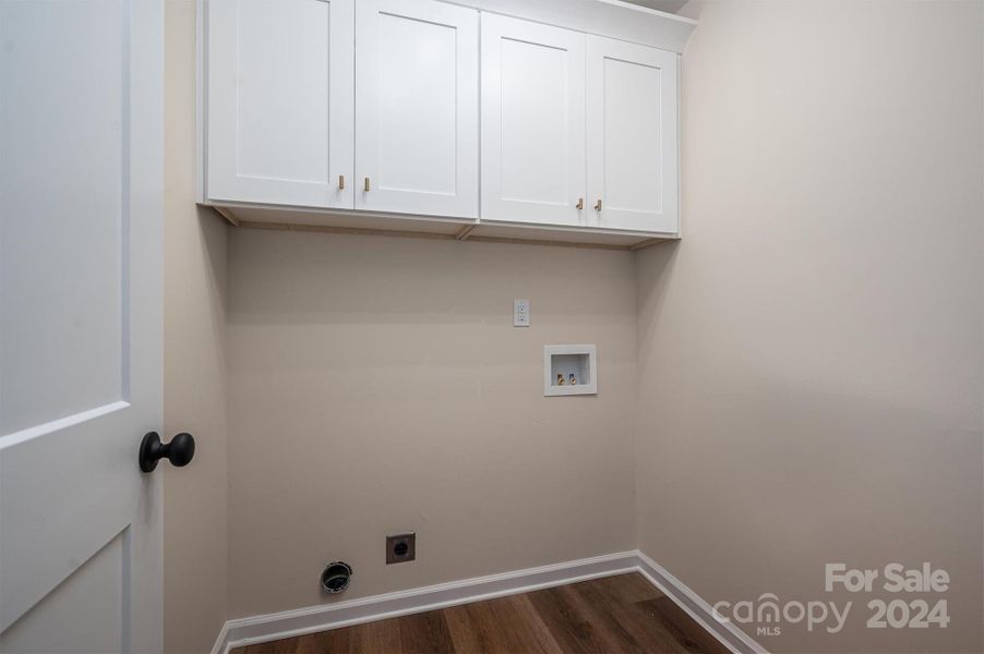 Laundry Room Centrally located in Hall