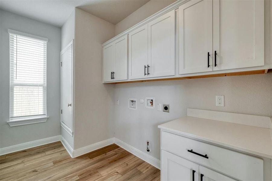 Laundry room has extra storage