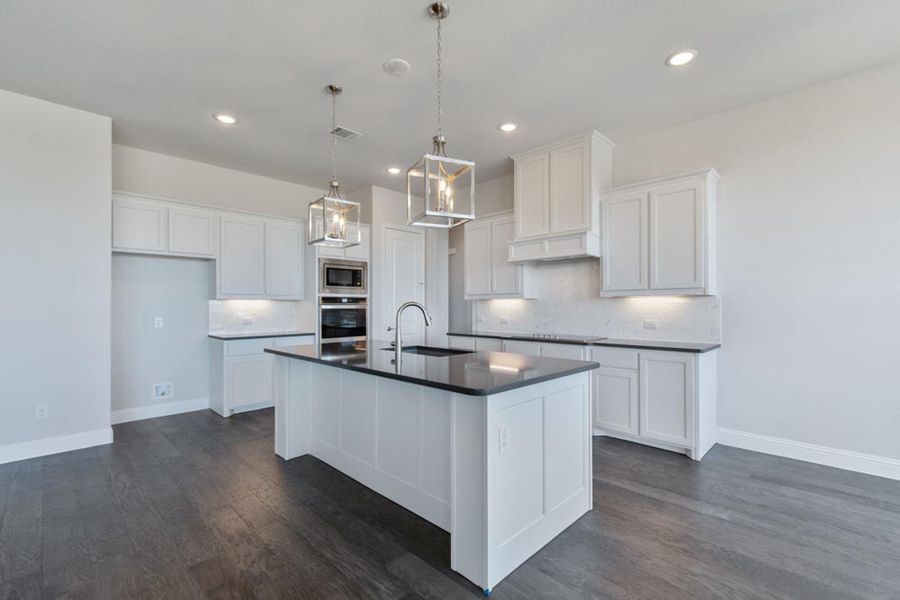 Kitchen | Concept 2406 at Hidden Creek Estates in Van Alstyne, TX by Landsea Homes