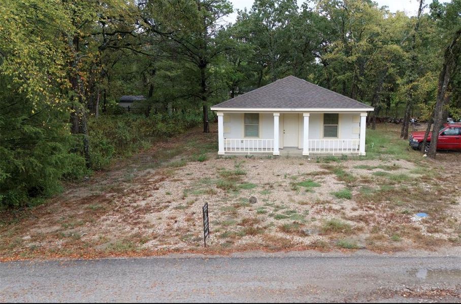 View of front of property featuring covered porch