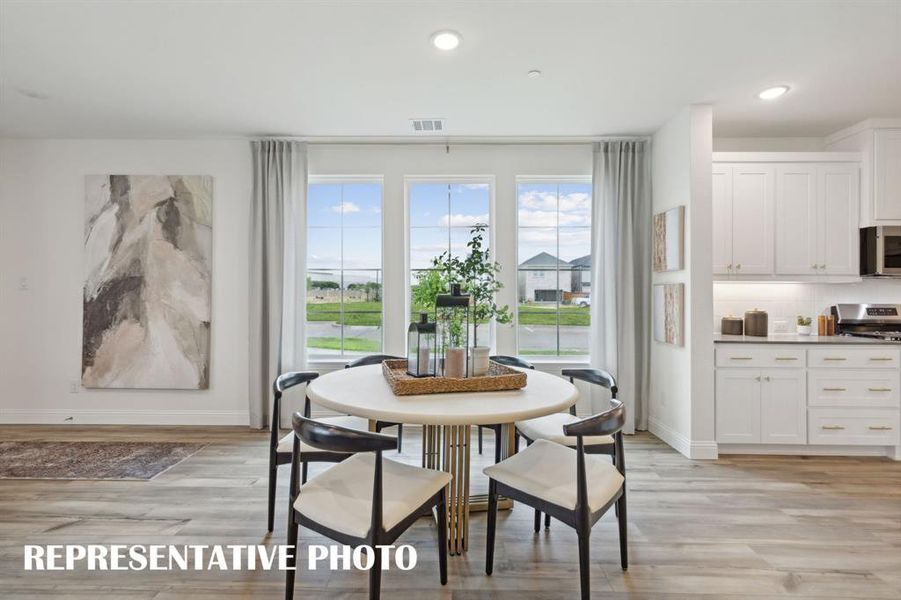 You'll be able to host fantastic family meals in this wonderful dining room!    REPRESENTATIVE PHOTO