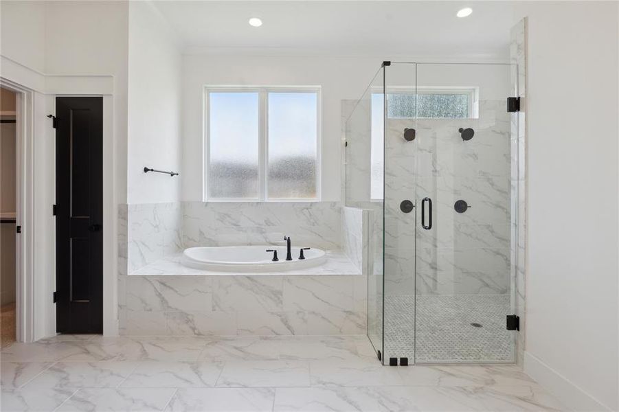 Bathroom with separate shower and tub and ornamental molding