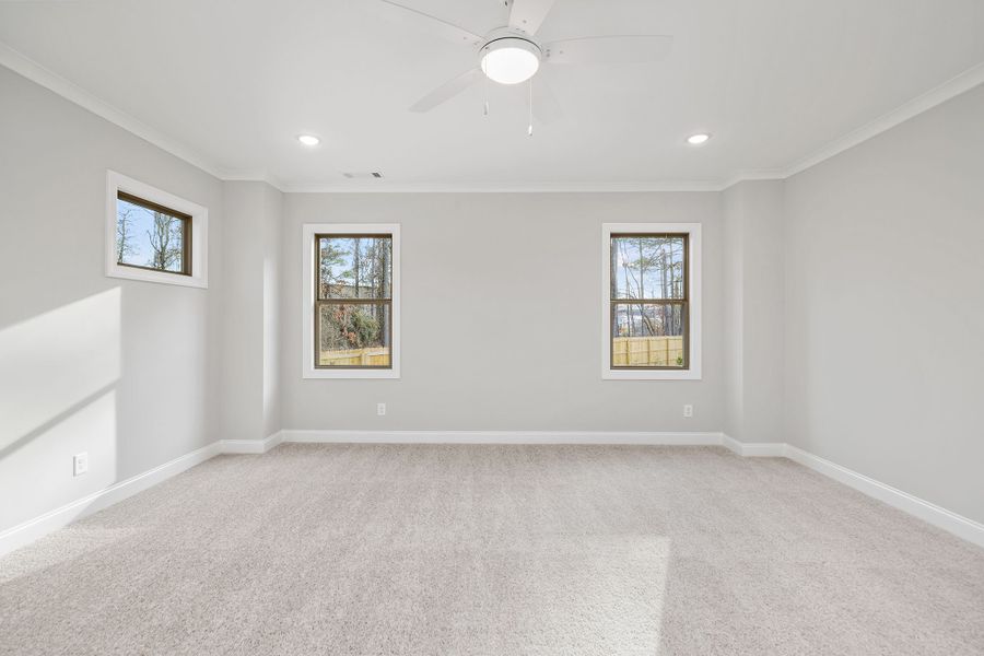 Primary bedroom features expansive master bath and walk-in closet