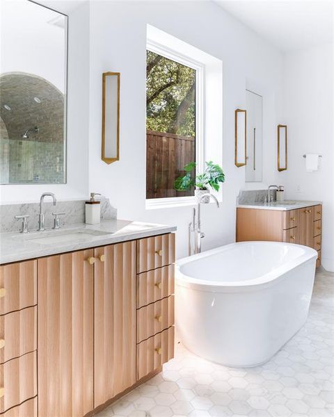 Bathroom with vanity, plus walk in shower, and tile patterned floors