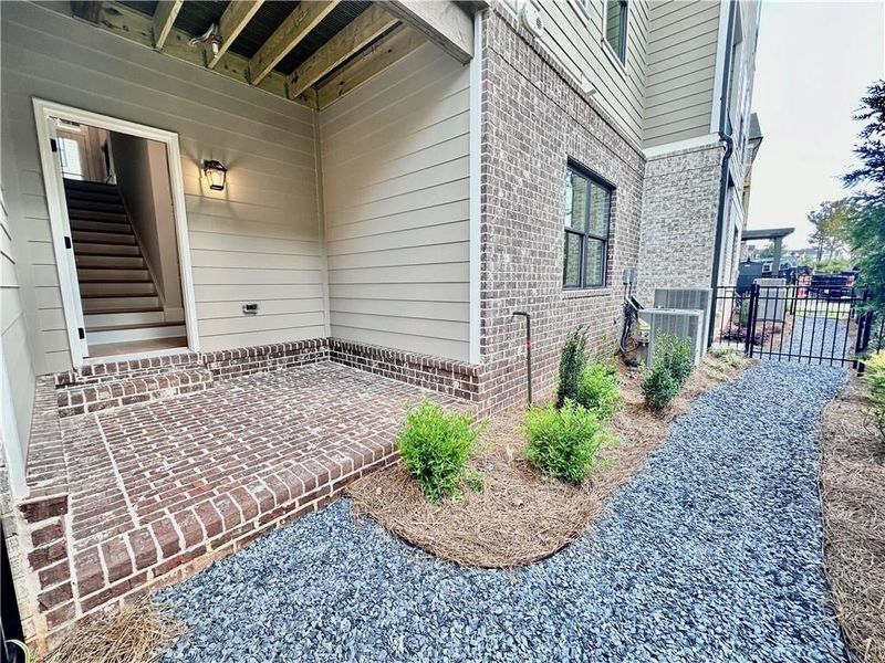 Terrace patio includes fully fenced in backyard, which is manicured by your HOA