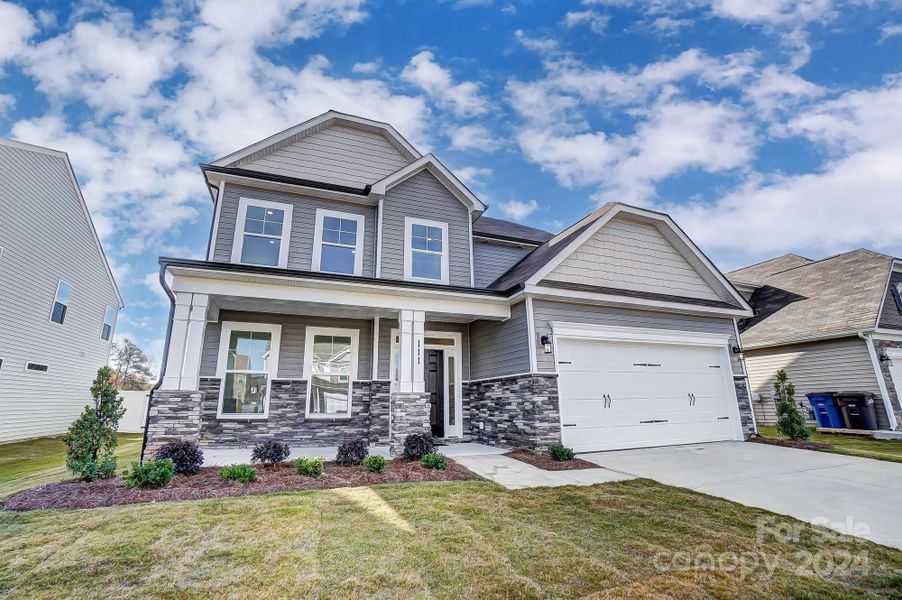 MOVE-IN READY! Homesite 29 features a Cypress floorplan with front load garage.