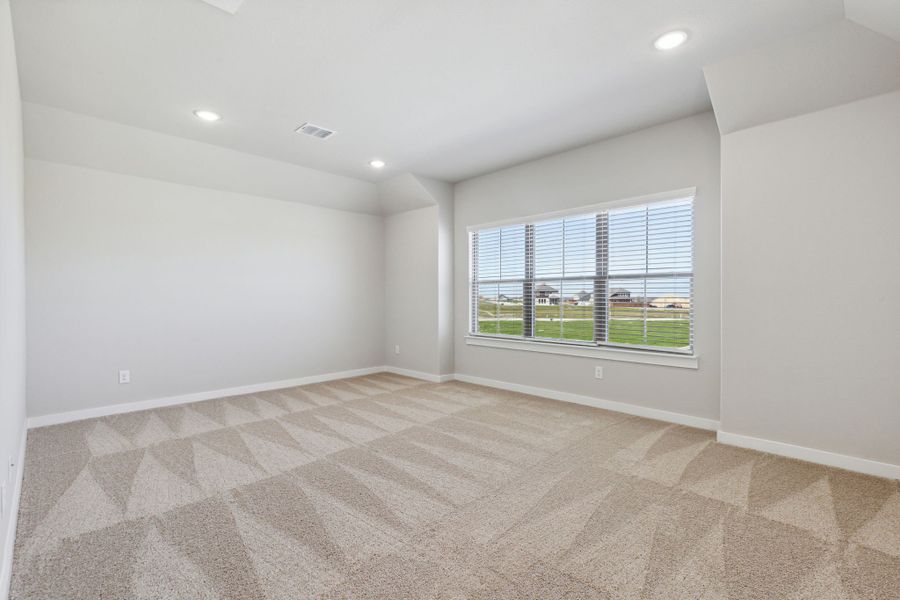 Game Room in the Oak home plan by Trophy Signature Homes – REPRESENTATIVE PHOTO