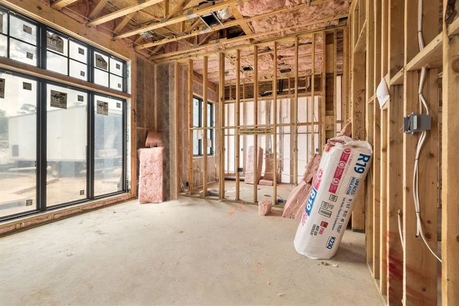 The spacious study enjoys a commanding view of the front lawn!