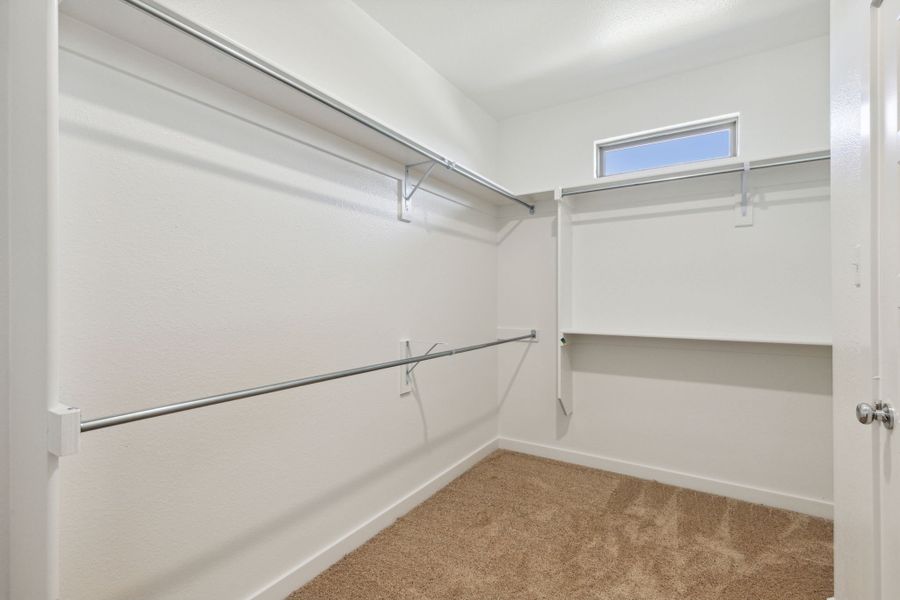 Primary Closet in the Oak home plan by Trophy Signature Homes – REPRESENTATIVE PHOTO