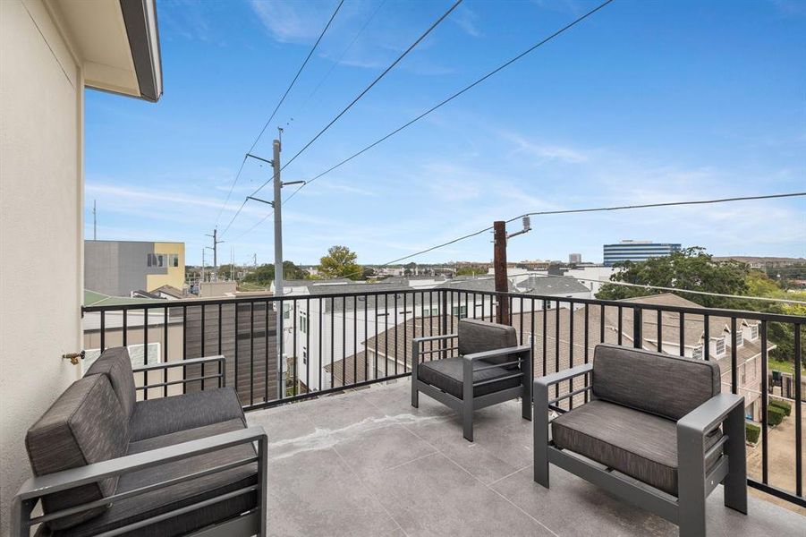 Elevate your outdoor living experience with the rooftop terrace, offering breathtaking Galleria views.