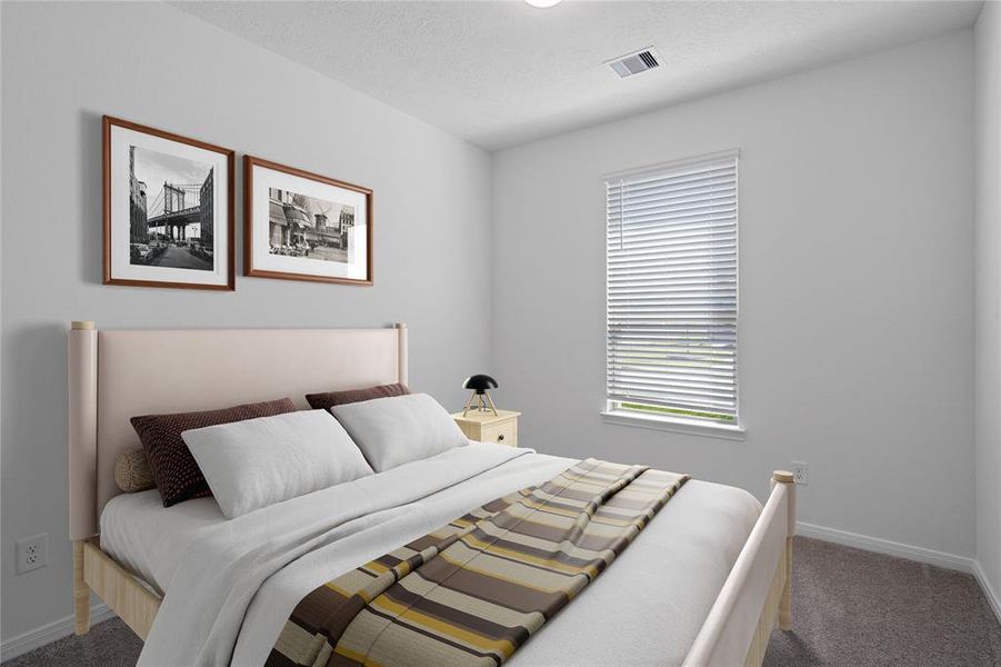 Secondary bedroom features plush carpet, neutral paint, lighting, large window with privacy blinds and ample sized closet space.