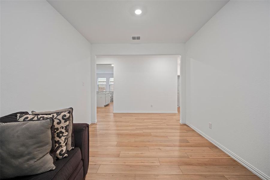 Hall featuring light hardwood / wood-style floors