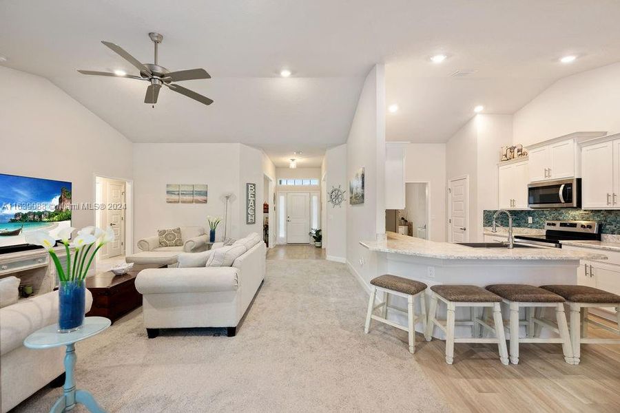 Open Living room with breakfast counter