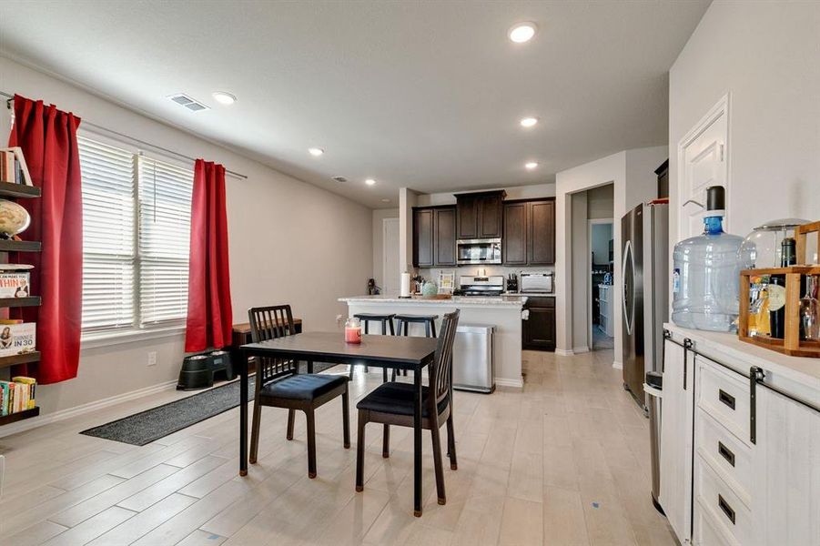 Dining space featuring light wood-type flooring