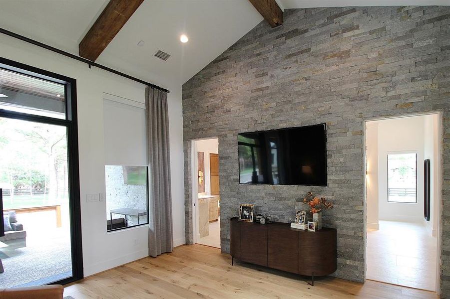 Gorgeous stone accent wall in the primary suite.