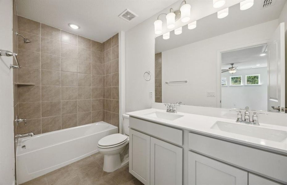 Upgraded secondary bathroom *real home pictured