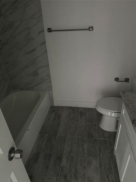 2nd Bathroom with toilet and vanity