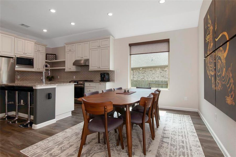 Large dining space can fit oversized table. Large window lets in plenty of natural light!