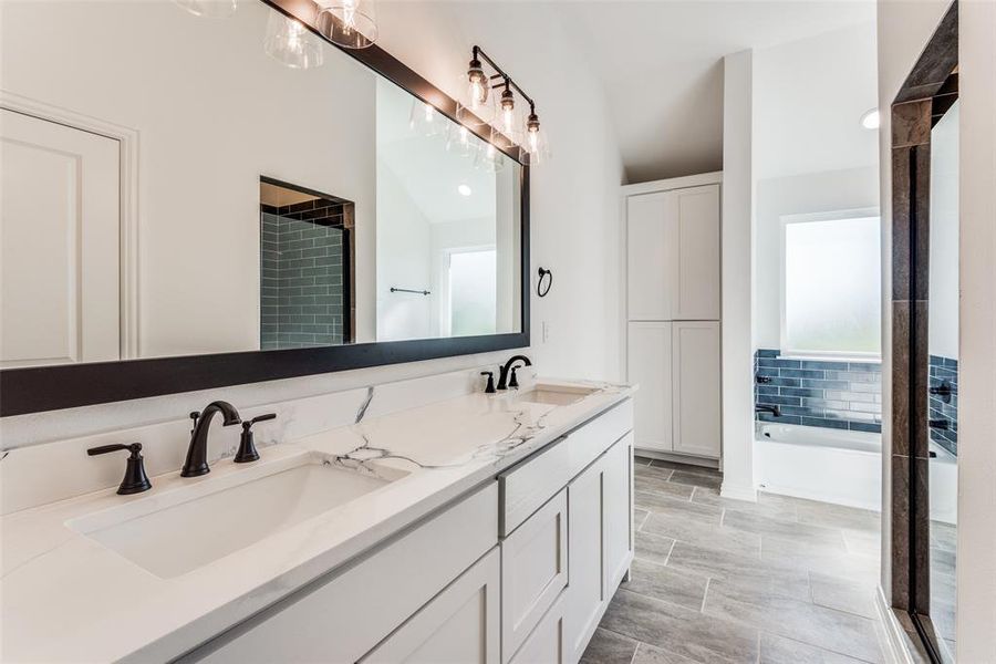 Bathroom with plus walk in shower and vanity